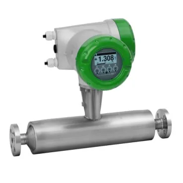 A Coriolis mass flow meter featuring a straight stainless steel flow tube with flanged ends, and a digital transmitter head with a green bezel displaying a reading.