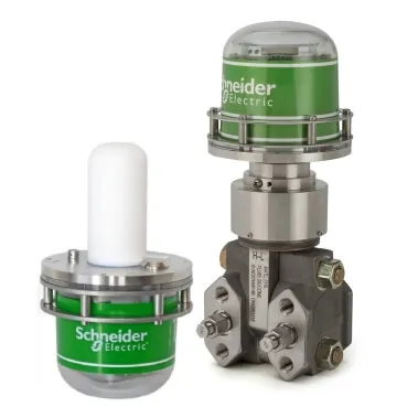 Two Schneider Electric wireless field instruments designed for an Instrument Area Network. One is mounted on a valve base with a clear dome, and the other has a white antenna cover.