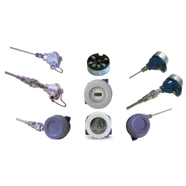 An assortment of industrial temperature sensors, including various temperature probes with connection heads, "hockey-puck" style transmitters, and field-mount digital indicators.